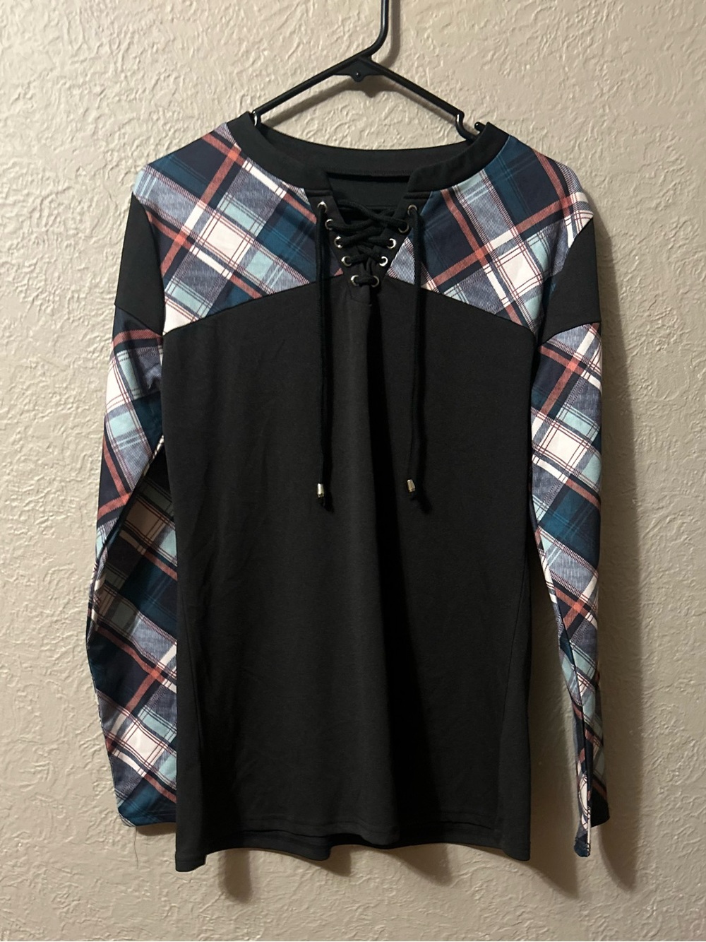 Black Lace-Up Pullover with Blue & Red Plaid Accents